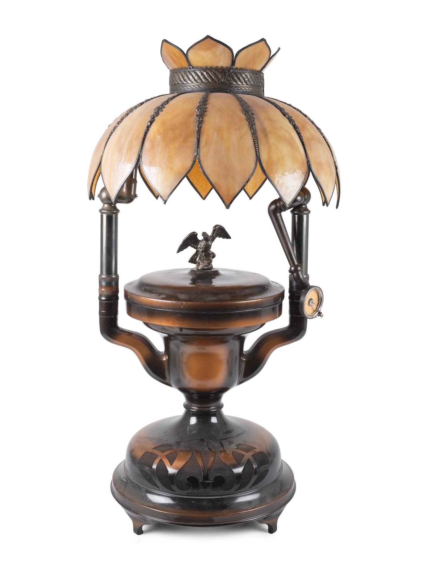 A Fairy Phonograph Patinated Metal Lamp with a Slag Glass Shade