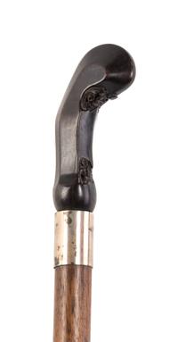 A Continental Sword Cane, Length of handle 4 x length overall 35 3/4 inches.
