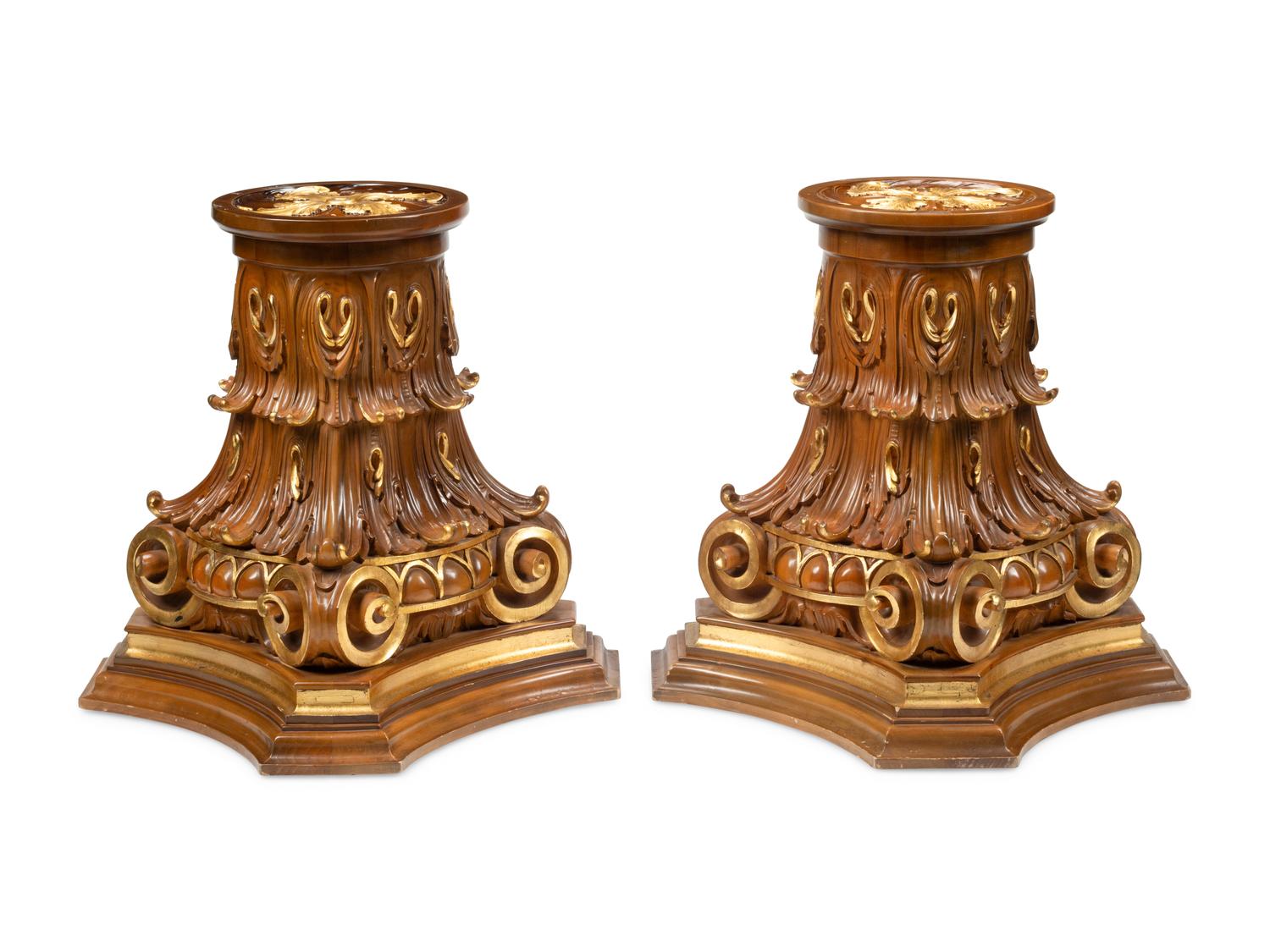 A Pair of Italian Carved and Parcel Gilt Column Capitals