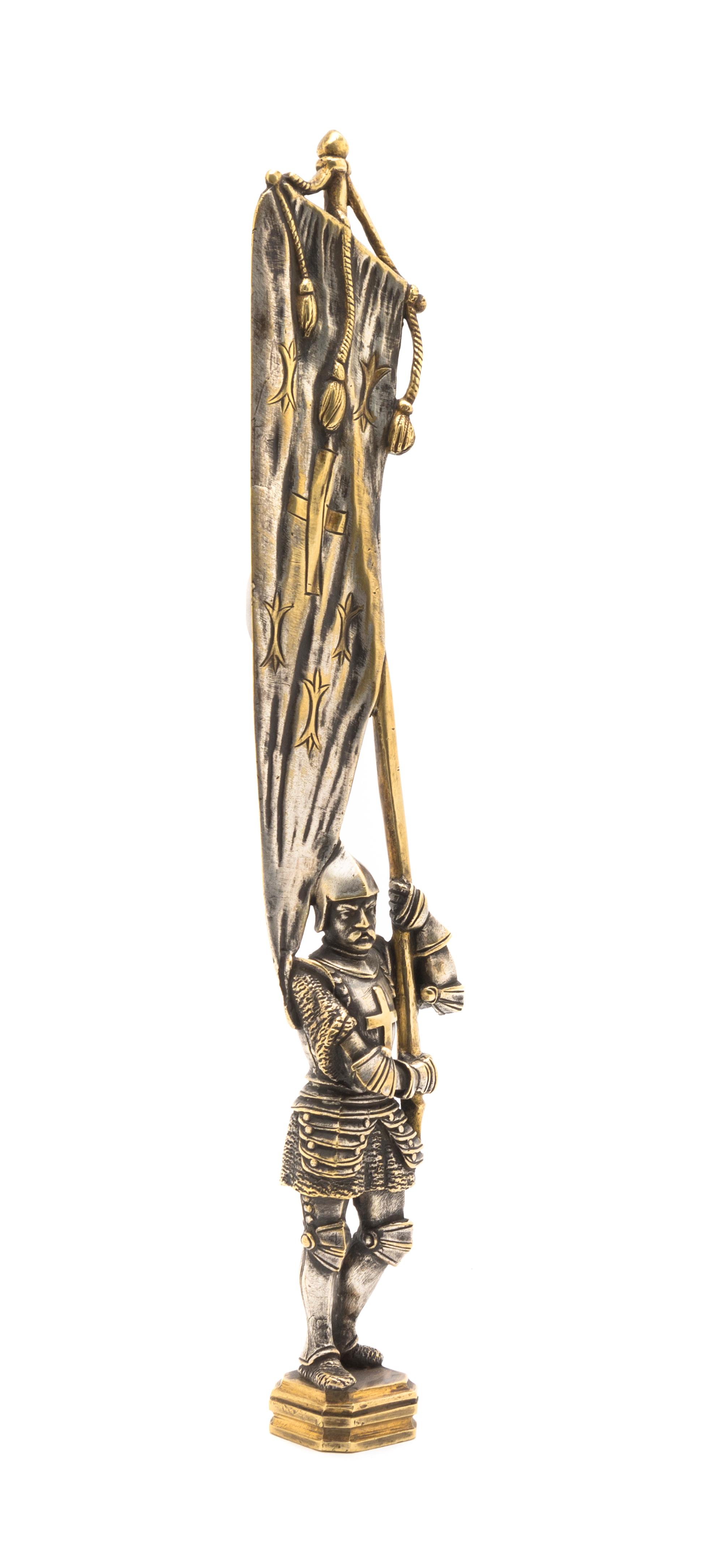 A Continental Silvered Metal Figural Seal, Height overall 8 5/8 inches.
