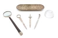 A Group of Decorative Articles Length of magnifying glass 12 5/8 inches.