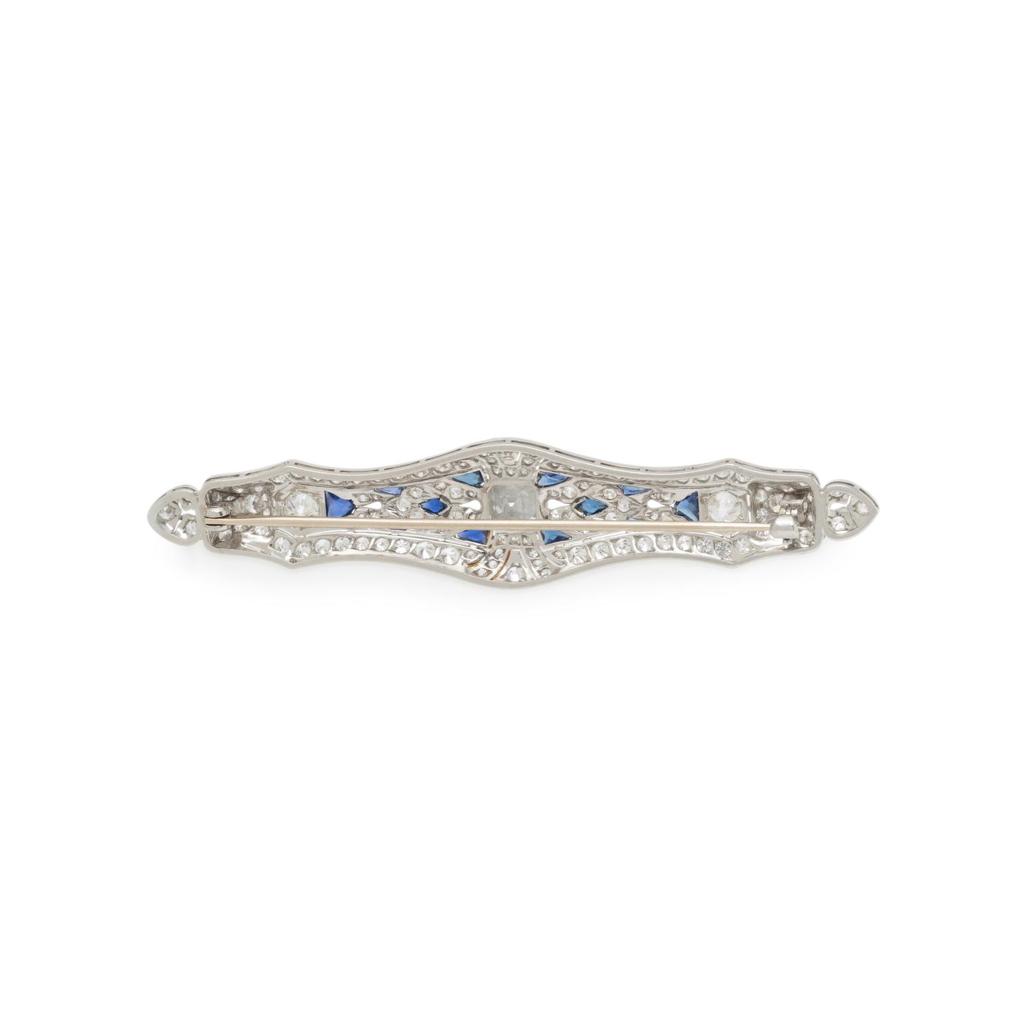 PLATINUM, DIAMOND, AND SYNTHETIC SAPPHIRE BROOCH