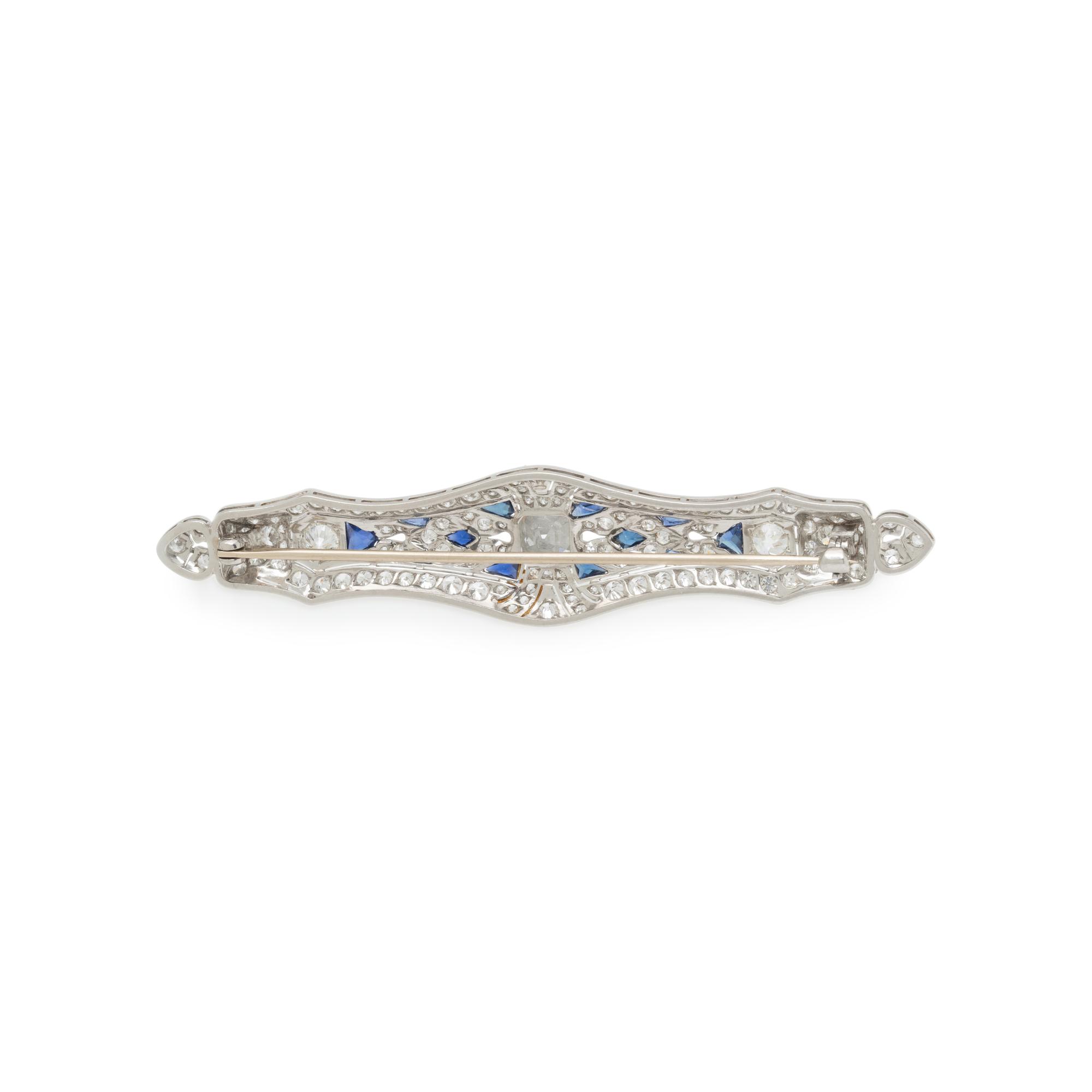 PLATINUM, DIAMOND, AND SYNTHETIC SAPPHIRE BROOCH