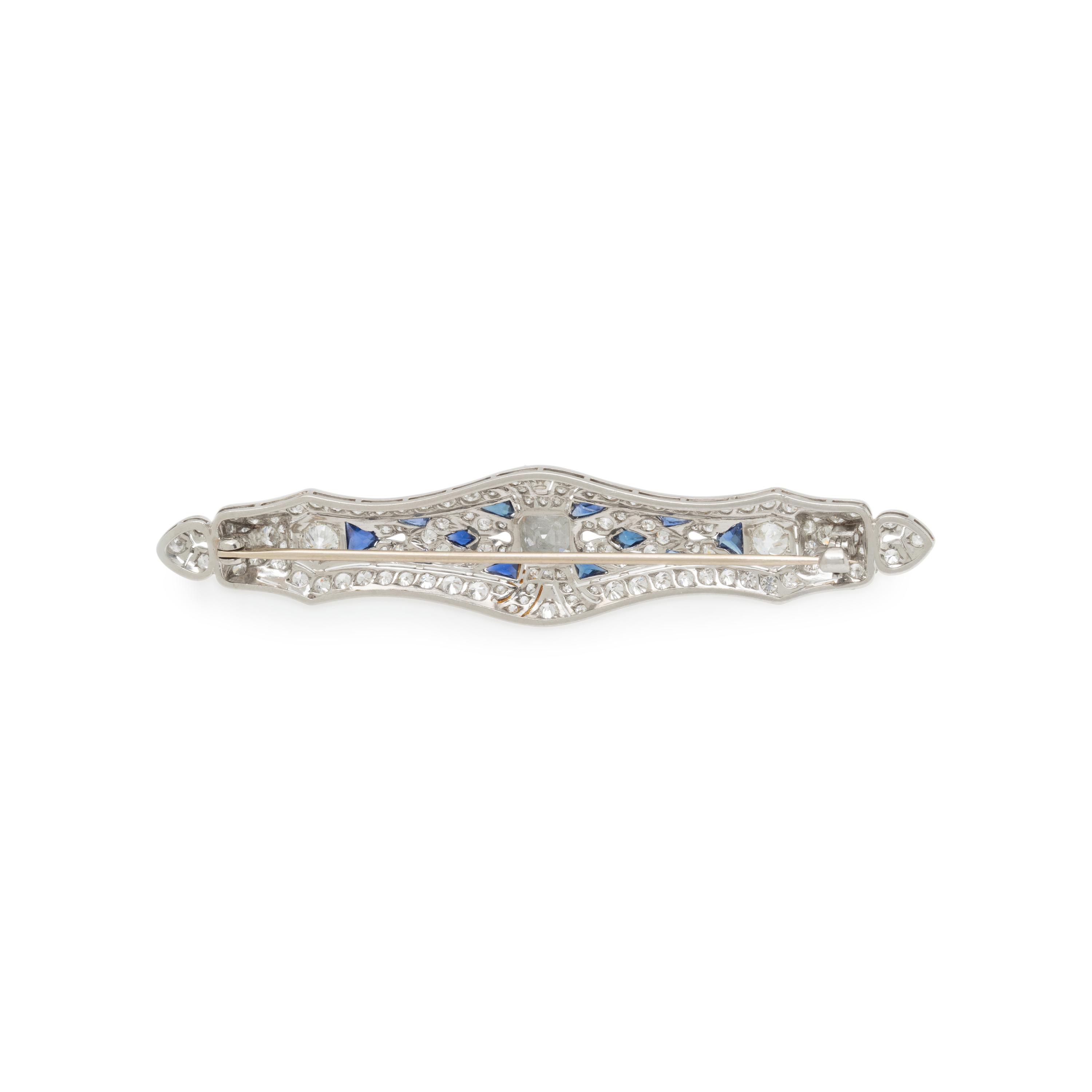 PLATINUM, DIAMOND, AND SYNTHETIC SAPPHIRE BROOCH
