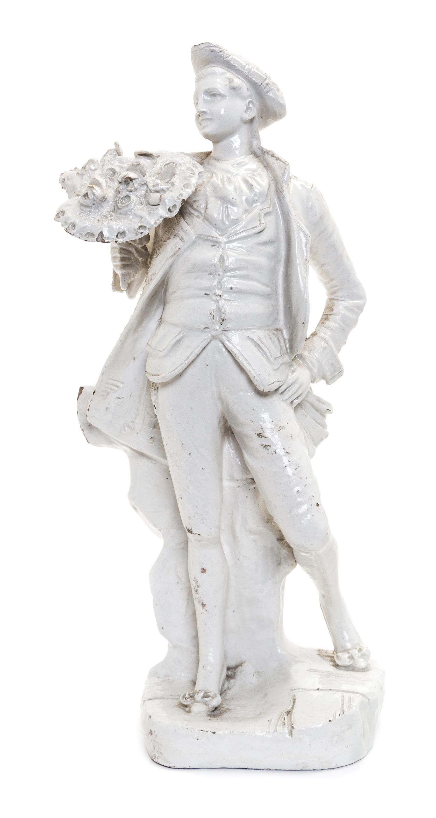 A Capo di Monte Stoneware Figure of a Man Height 9 1/2 inches.