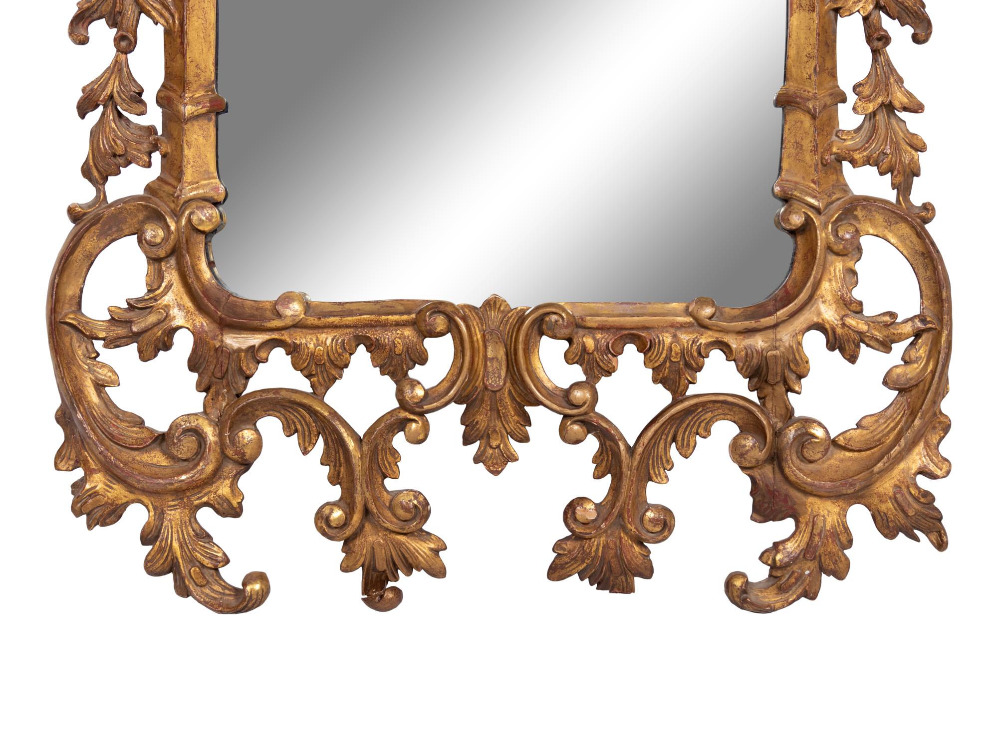A Pair of George III Carved Giltwood Mirrors