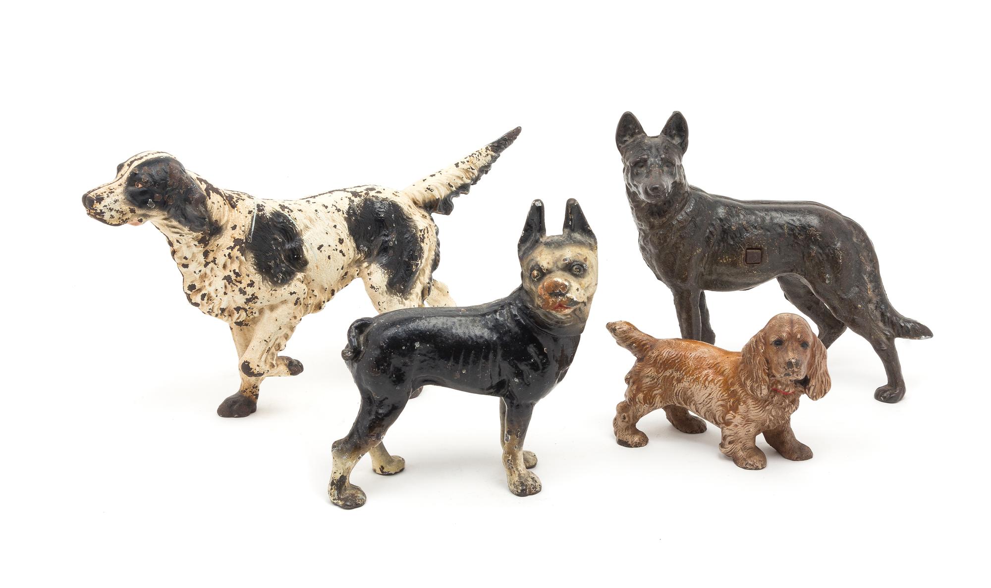 A Group of Four Painted Iron Door Stops Height of tallest 8 1/2 inches. — LATE 19TH CENTURY