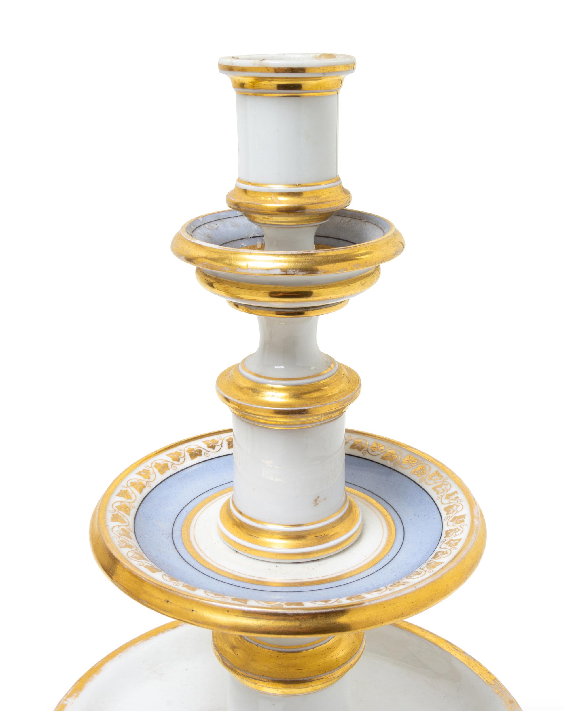 A Pair of Paris Porcelain Candlesticks