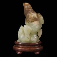 A rare Chinese jade carving of a foreigner and mythical beast 胡人戏兽玉雕 Tang dynasty or later ????