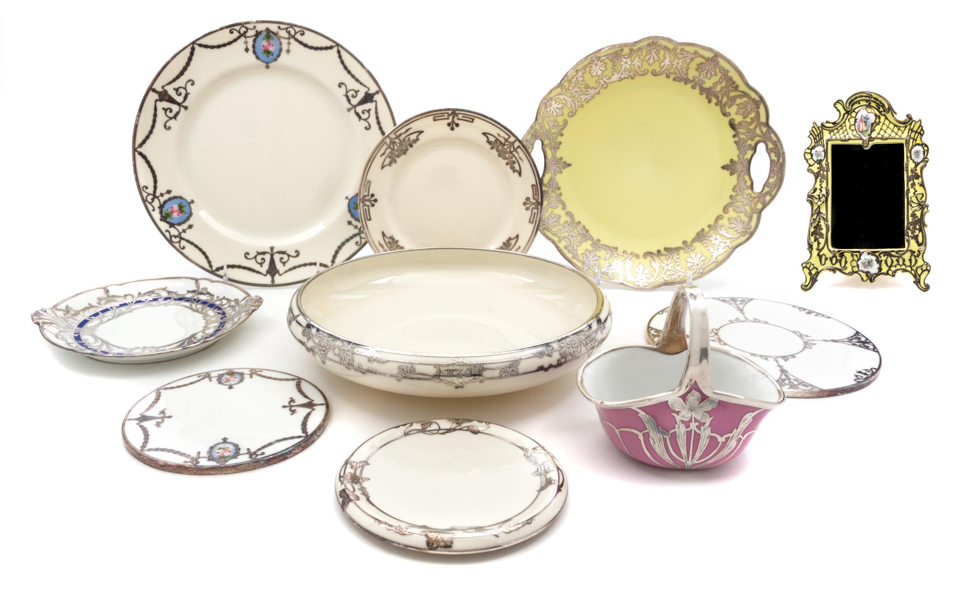 A Group of Silver Overlay Porcelain Articles Diameter of widest 10 1/2 inches.