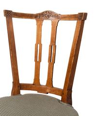 A Set of Four Dutch Fruitwood Dining Chairs