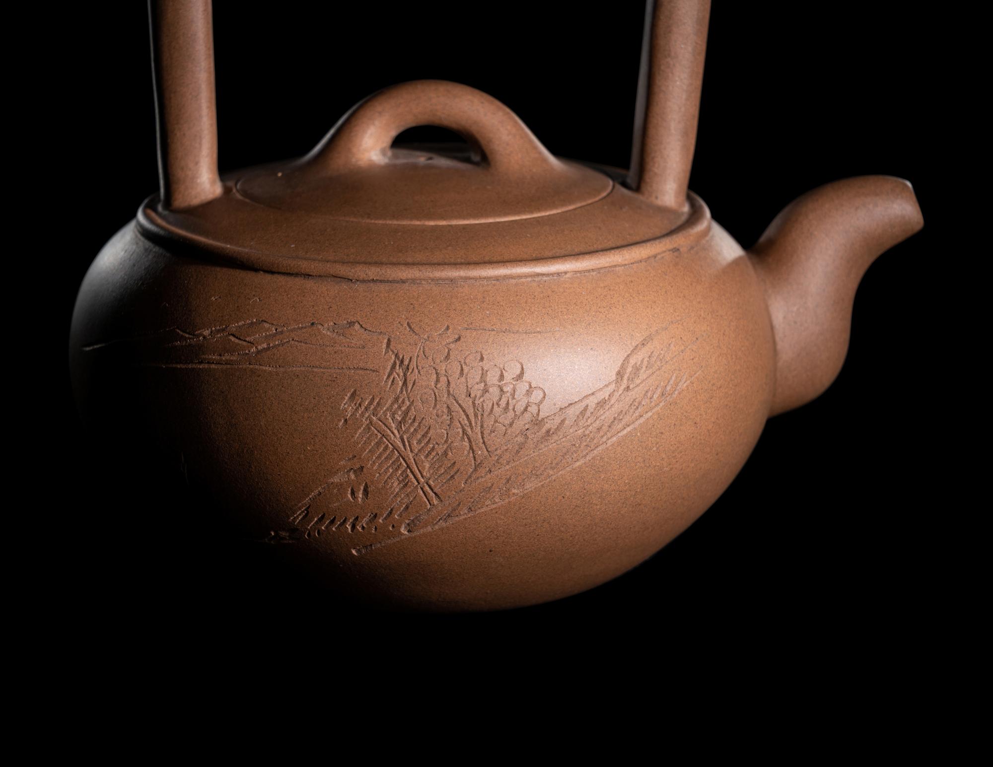 A Chinese Yixing Zisha Pottery Teapot