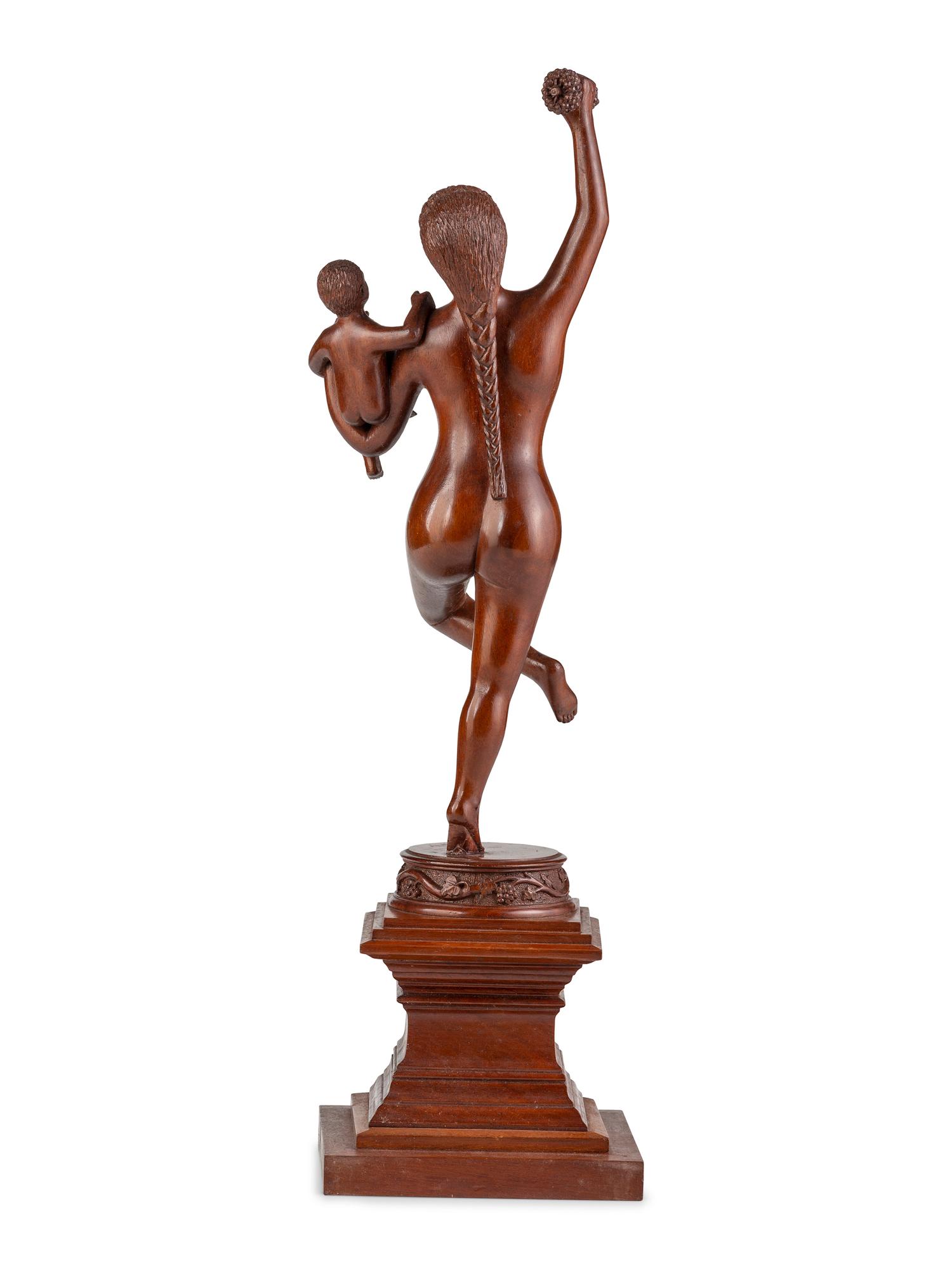 An American Carved Cherrywood Bacchante and Infant Sculpture