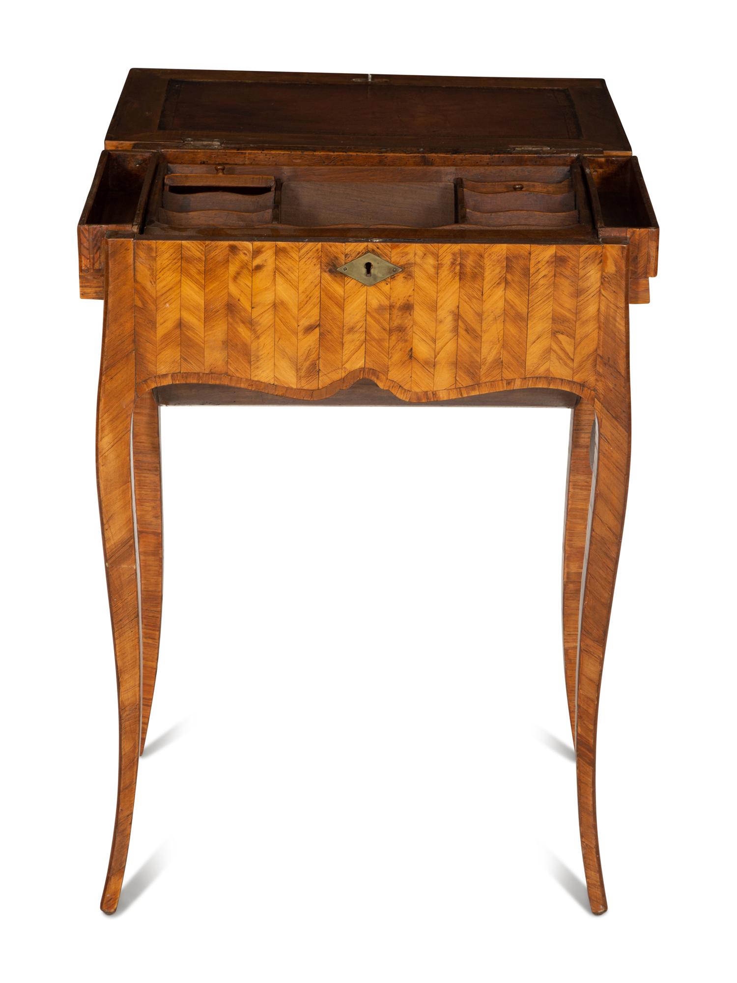 A Louis XV Tulipwood Parquetry Bureau Capucin