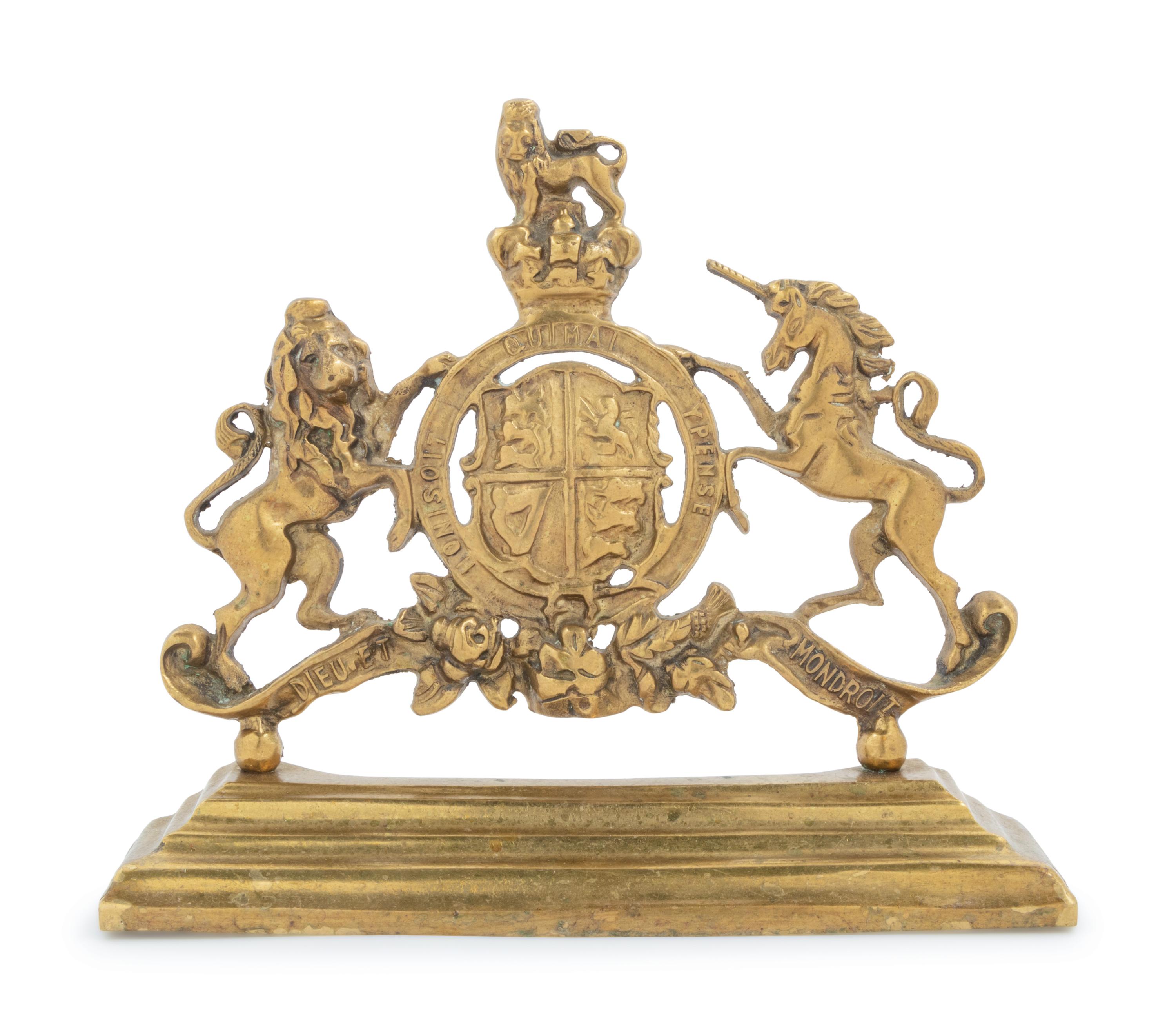 An English Brass Armorial Doorstop