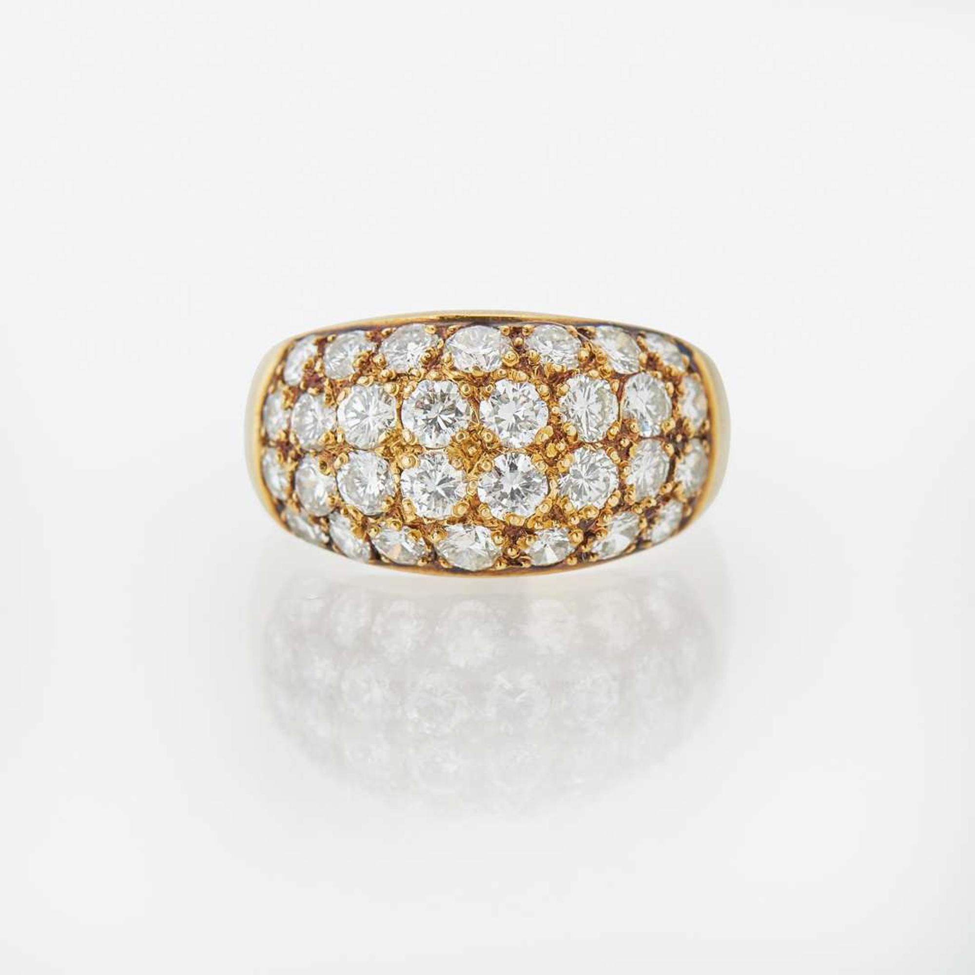 An 18K Yellow Gold and Diamond Ring