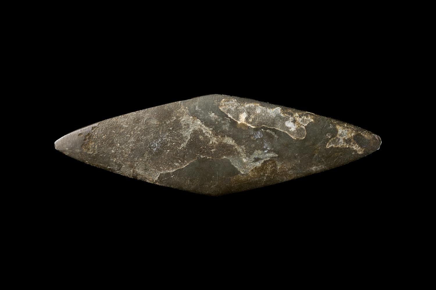 An Egyptian Schist Lozenge-Shaped Palette