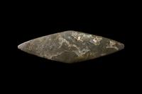 An Egyptian Schist Lozenge-Shaped Palette