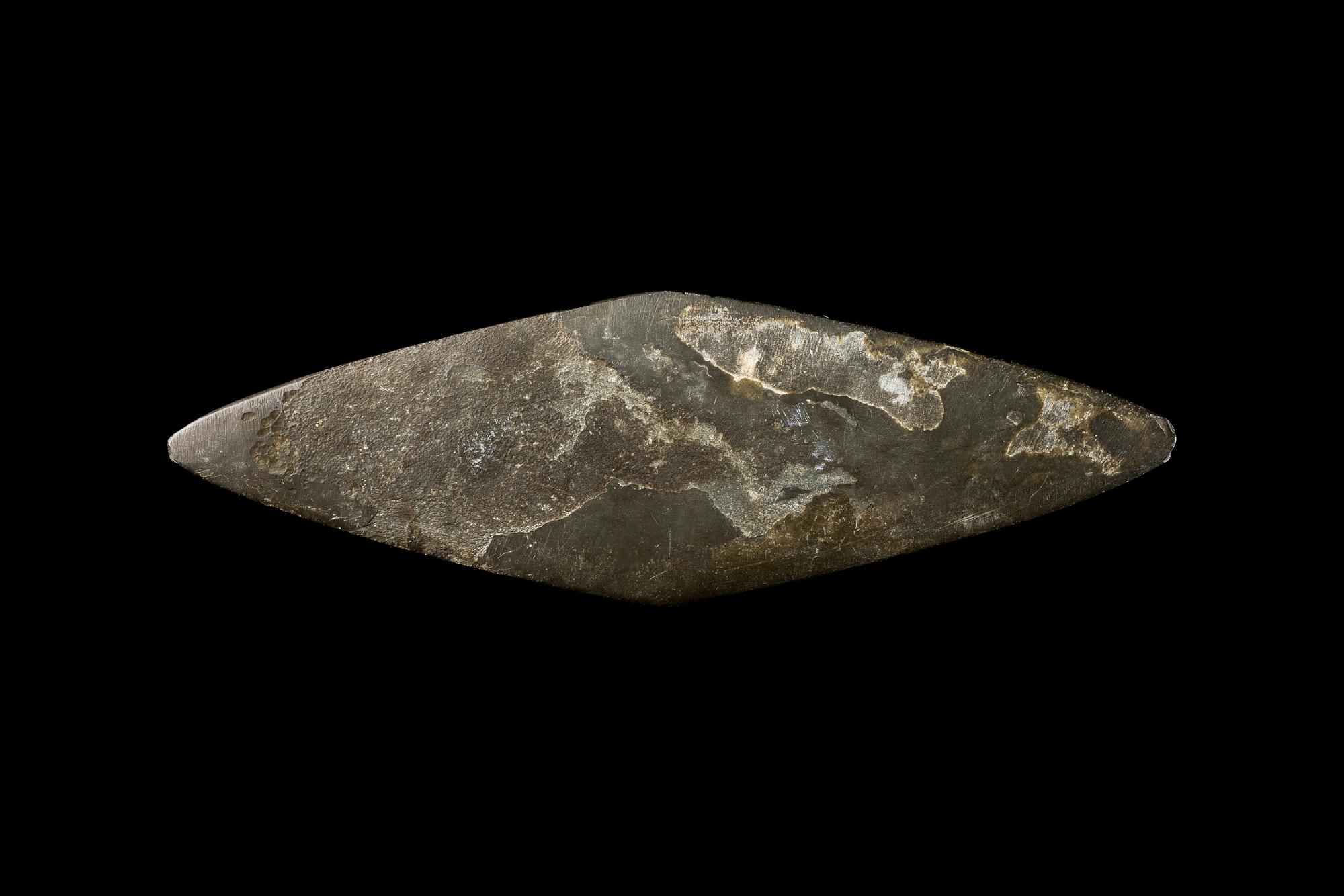 An Egyptian Schist Lozenge-Shaped Palette