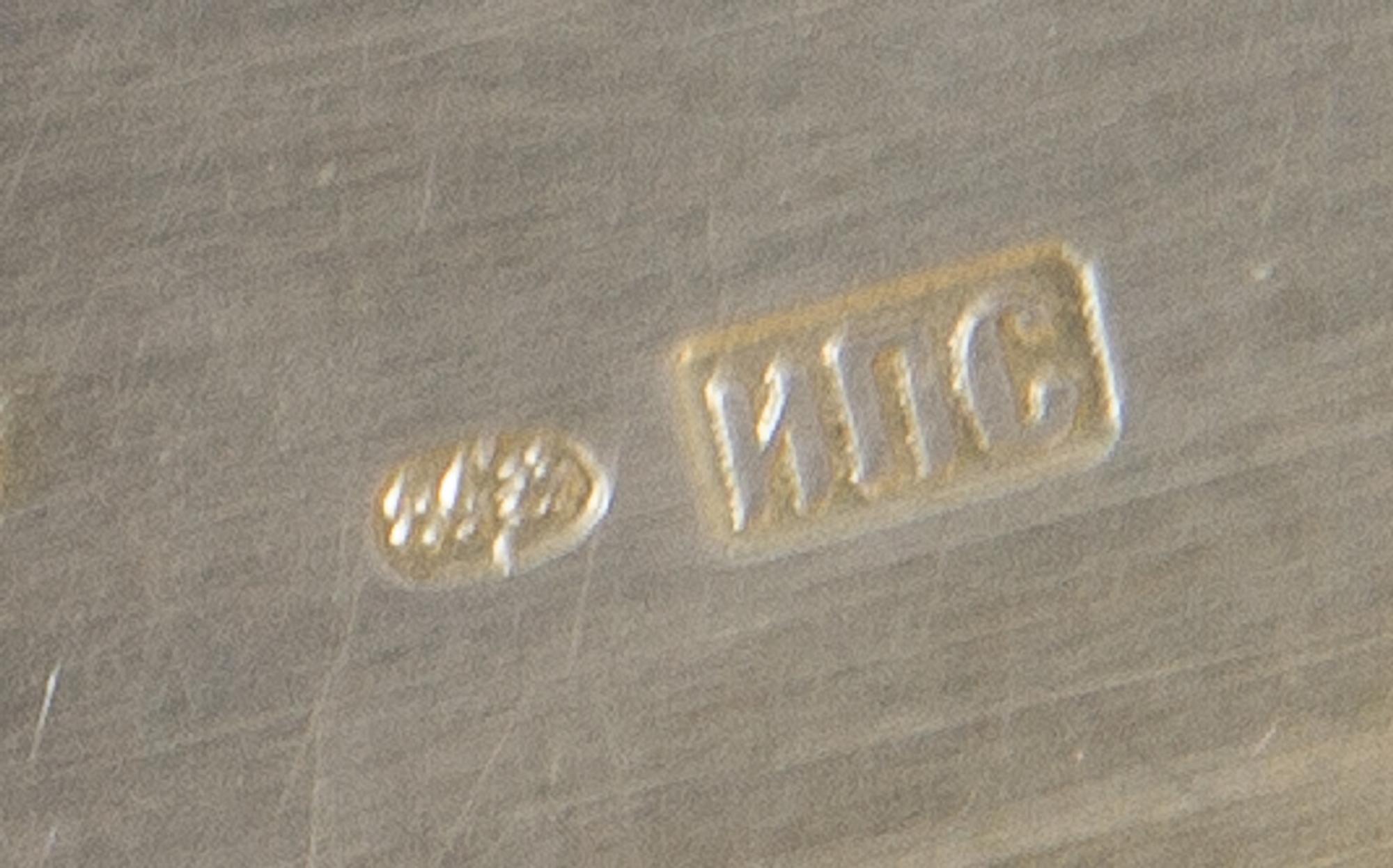 A Russian Silver Cigarette Case, Ivan Speshnev, Moscow, late 19th/early 20th century, the case with engraved patterns and foliate motif