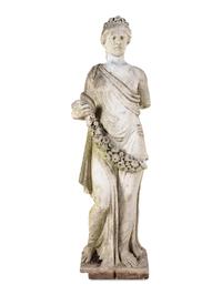 A Carved Marble Figure of a Maiden with Garlands