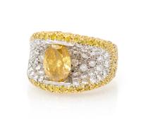 A 19 Karat Gold, Fancy Color Diamond and Diamond Ring, 11.00 dwts.