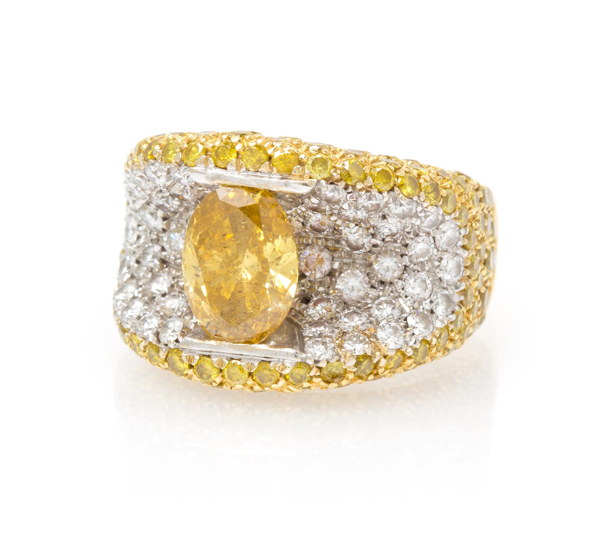 A 19 Karat Gold, Fancy Color Diamond and Diamond Ring, 11.00 dwts.