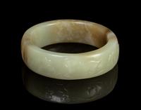 A Chinese White Jade Bangle LATE MING/EARLY QING DYNASTY Diameter overall 3 1/8 inches. — LATE MING/EARLY QING DYNASTY