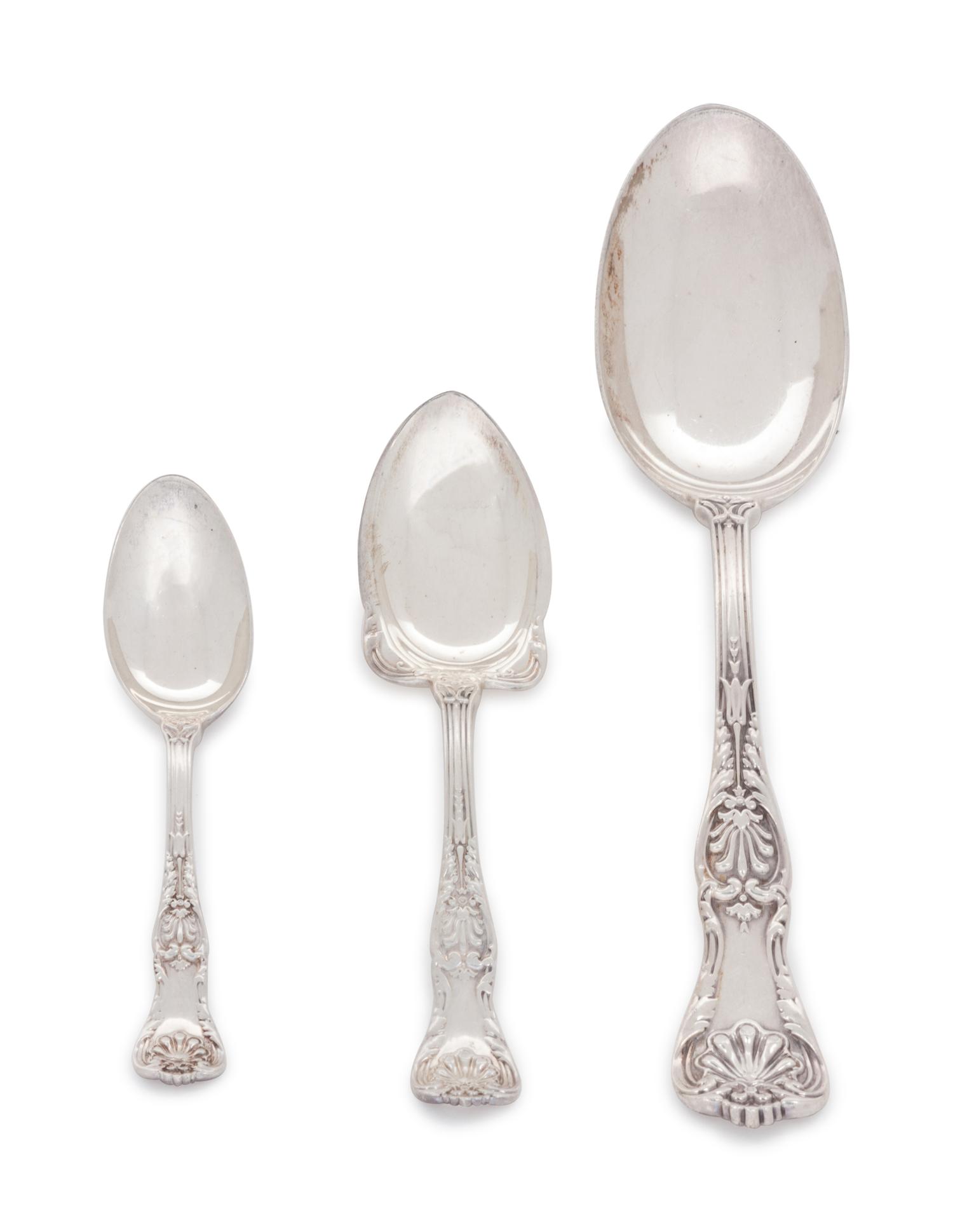 in the King George pattern, comprising: 6 steak knives with stainless steel blades 5 tablespoons 7 fruit spoons 11 ice cream spoons 11 oval spoons 11 teaspoons 11 demitasse spoons 62 pieces total.