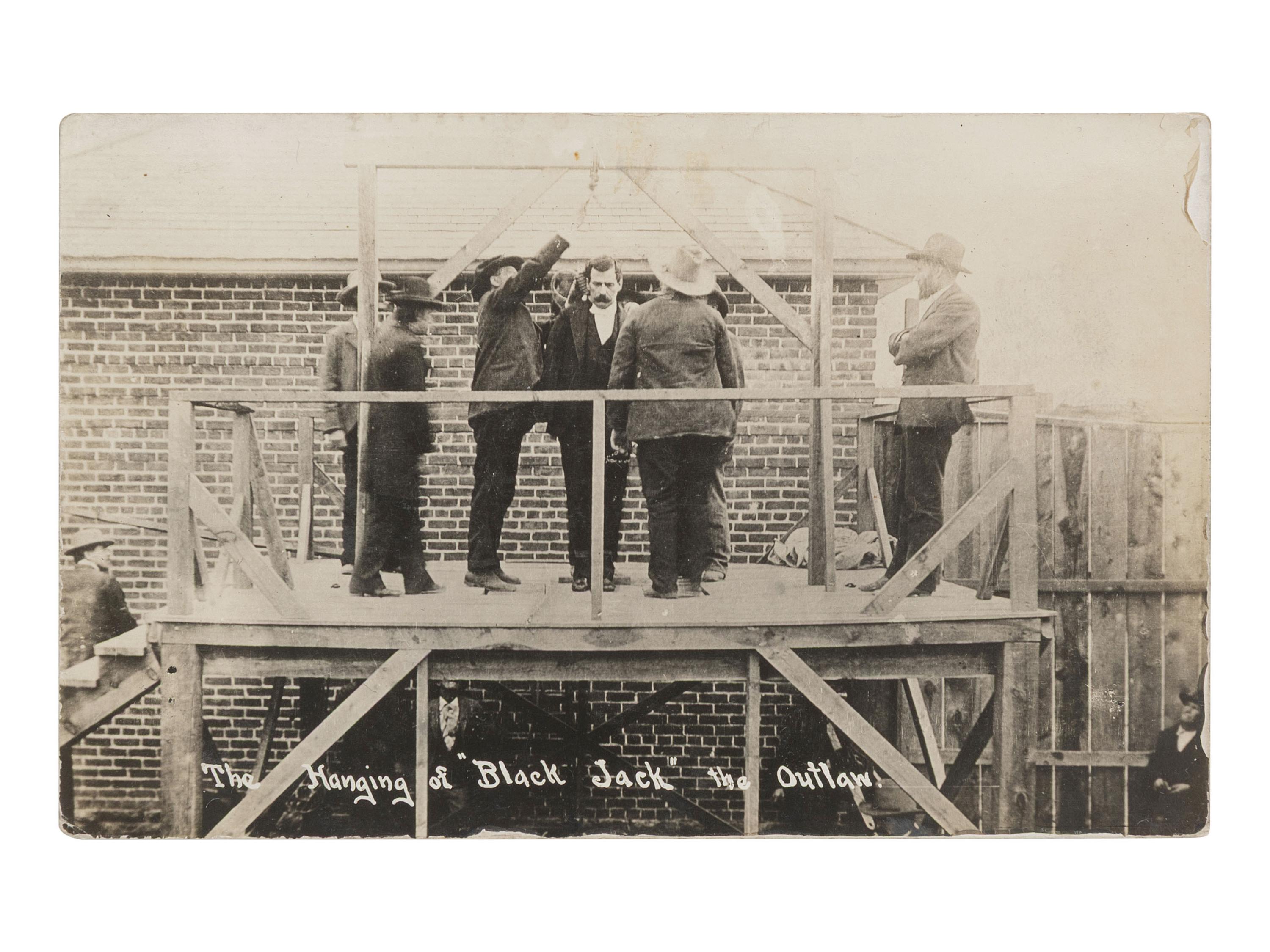 [OUTLAWS] 2 real photo postcards showing the hanging of Thomas E. "Black Jack" Ketchum [April 1901].
