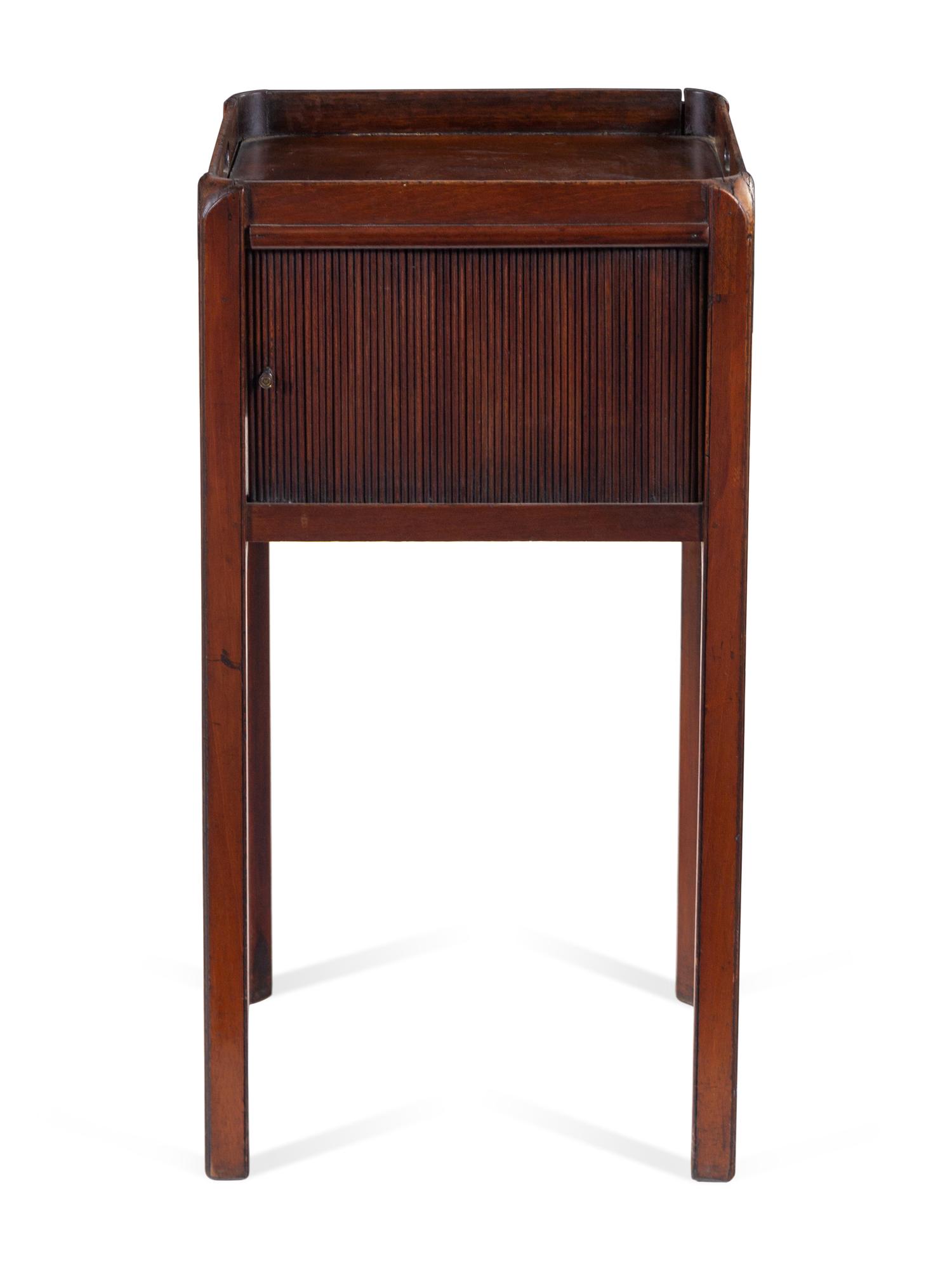 A Late George III Carved Mahogany Decanter Table