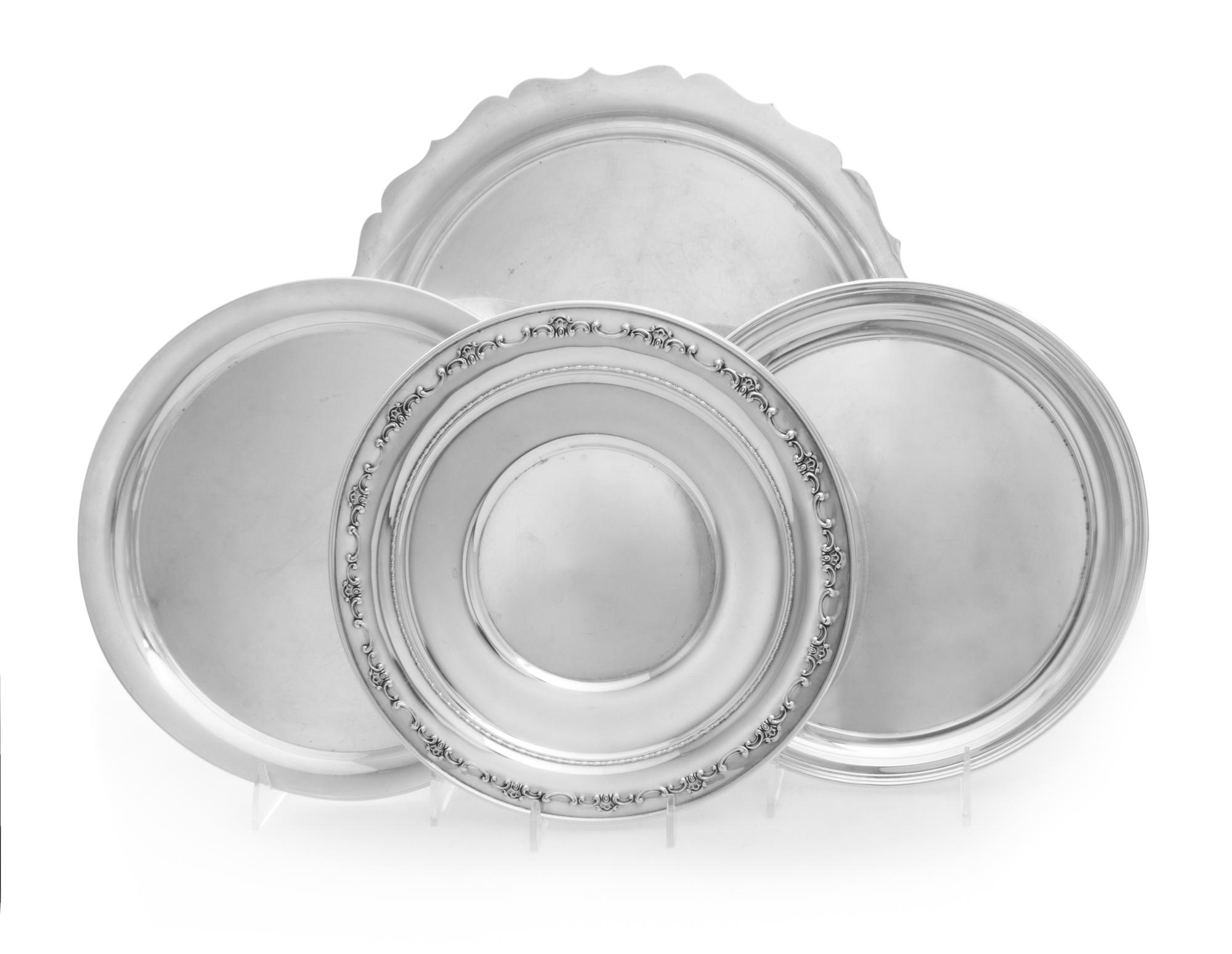 Four American Silver Circular Trays, Various Makers, each of circular form, the largest example with a scalloped edge.