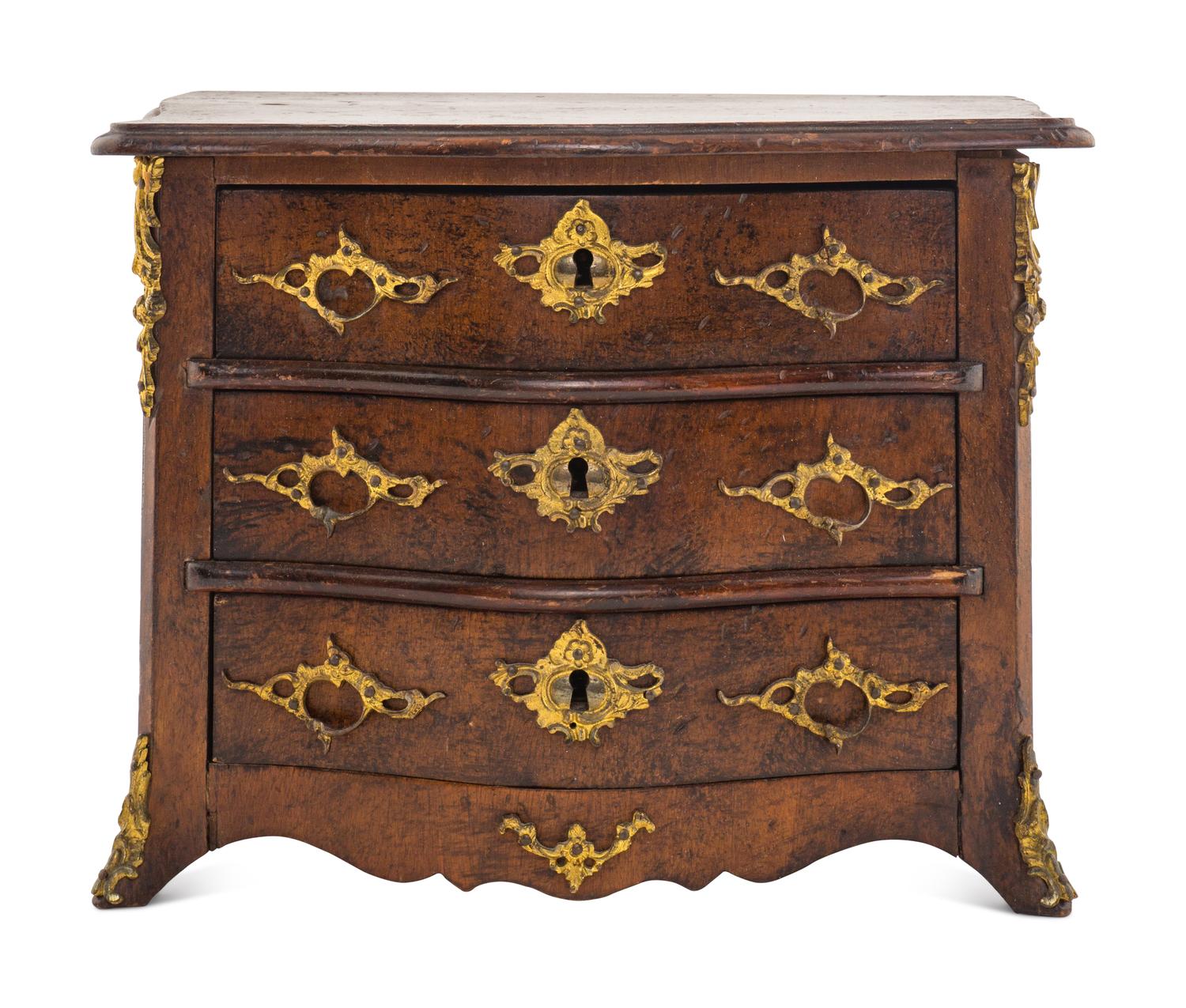 A Louis XV Style Walnut Diminutive Commode