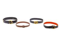 Group of Four Designer Belts by Gucci, Cartier, and Salvatore Ferragamo