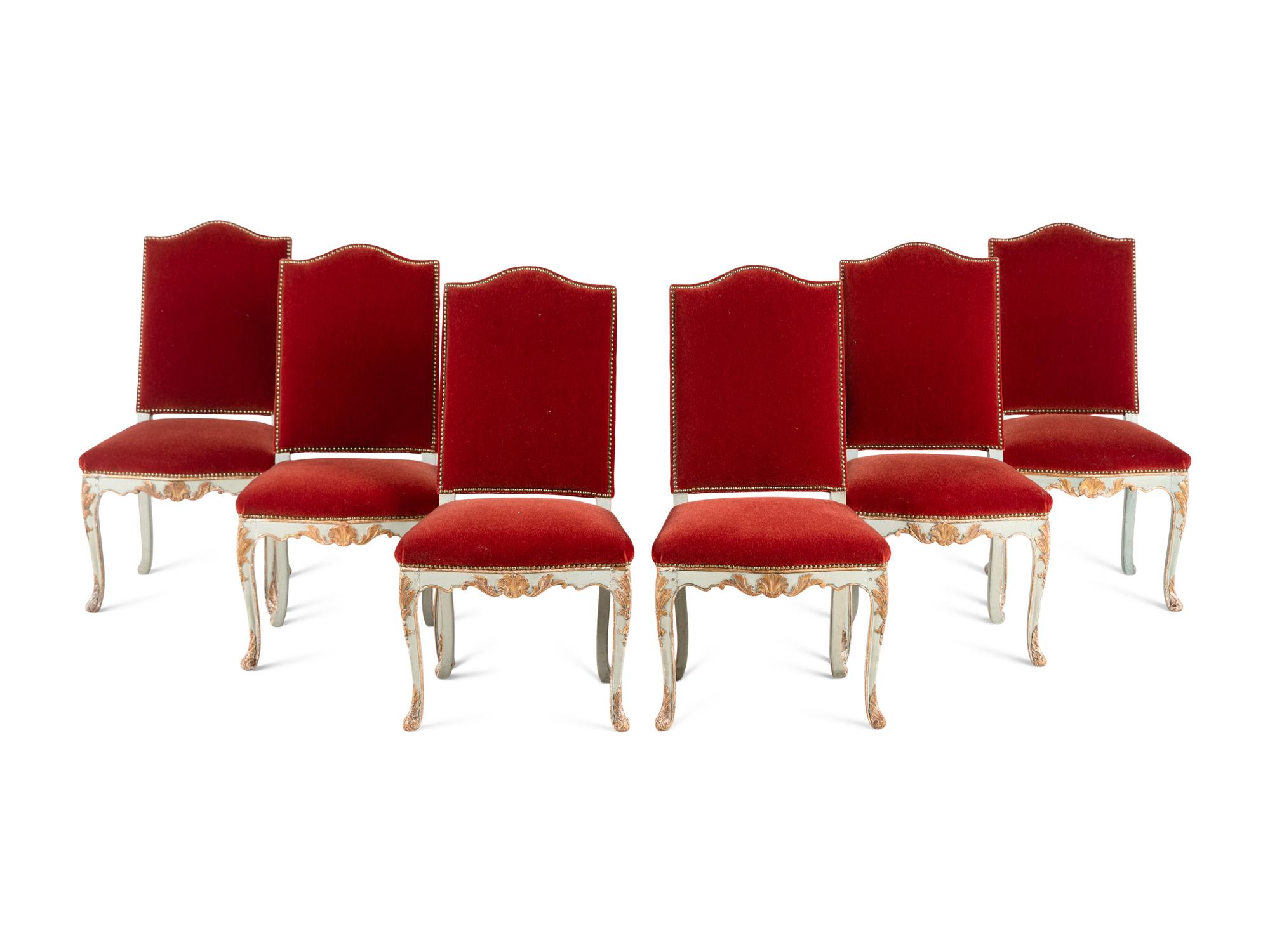 A Set of Six Louis XV Blue Painted and Parcel-Gilt Dining Chairs