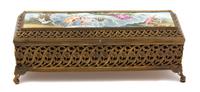 A Continental Gilt Metal Jewel Box with Painted Enamel Inset Top Height 4 1/4 x width 11 7/8 x depth 4 inches. — EARLY 20TH CENTURY
