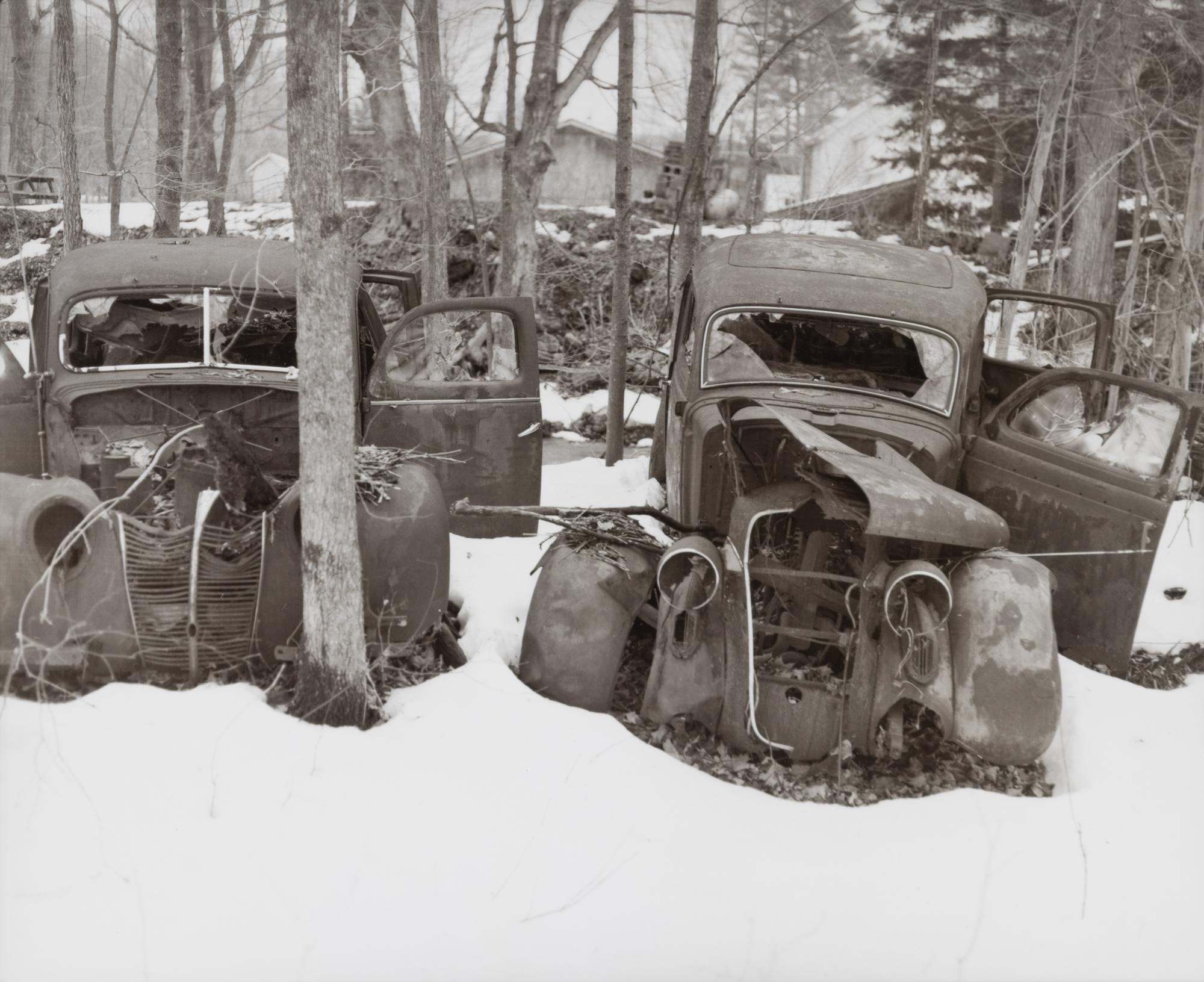 A group of fourteen photographs
