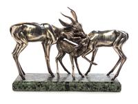 An Italian Silver Sculpture, Sirio Tofanari, Circa 1950, depicting two gazelles with their fawn, on a marble base.