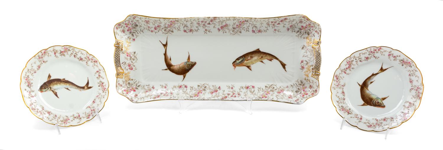 A Limoges Porcelain Fish Service comprising 12 plates and a…