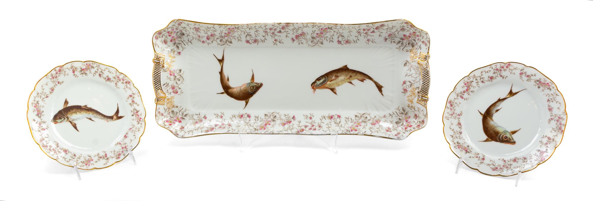 A Limoges Porcelain Fish Service comprising 12 plates and a…
