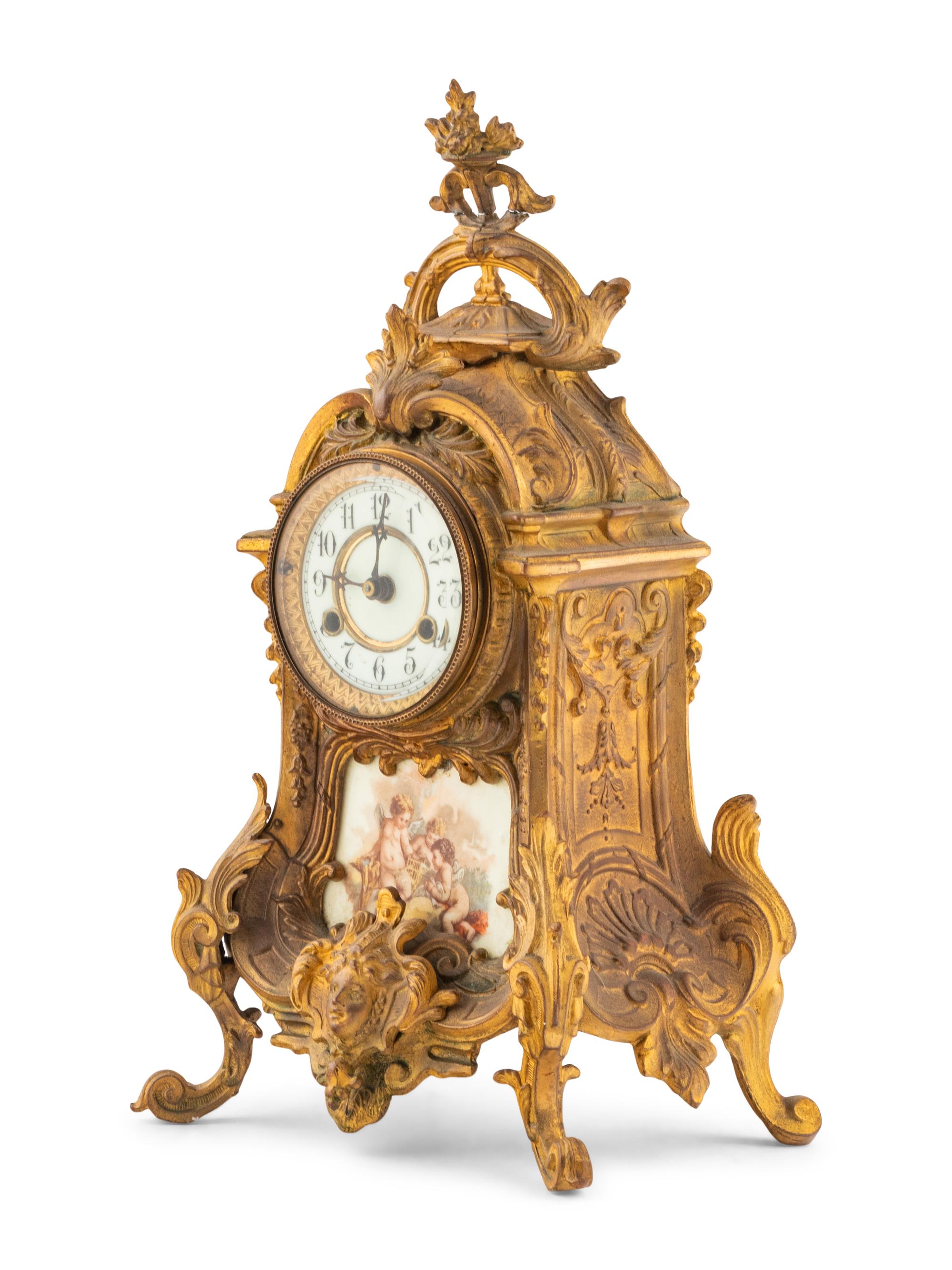 A Porcelain-Mounted Gilt Metal Mantel Clock