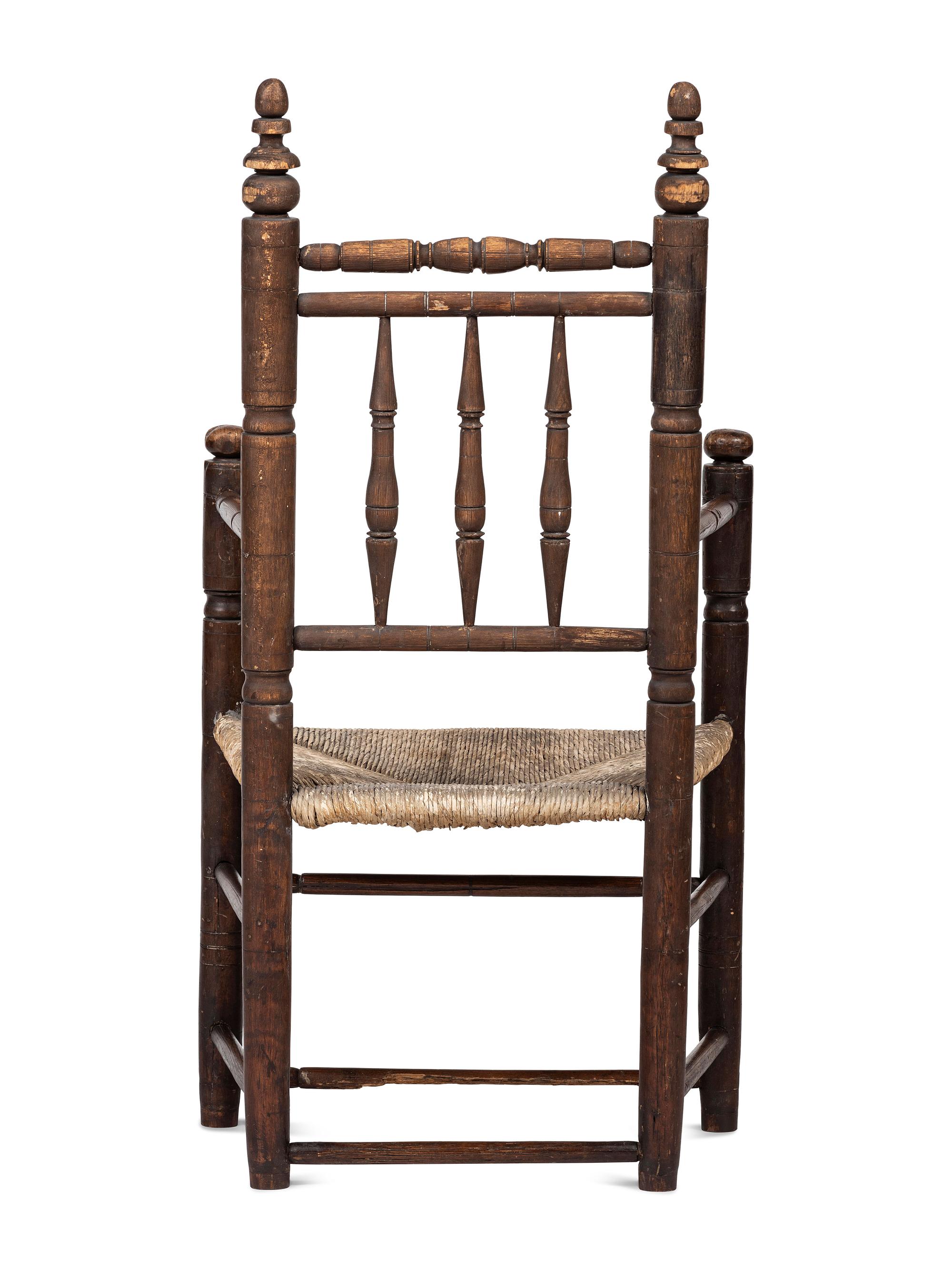 A Pilgrim Century Turned Maple and Oak Spindle-Back Rush-Seat Armchair