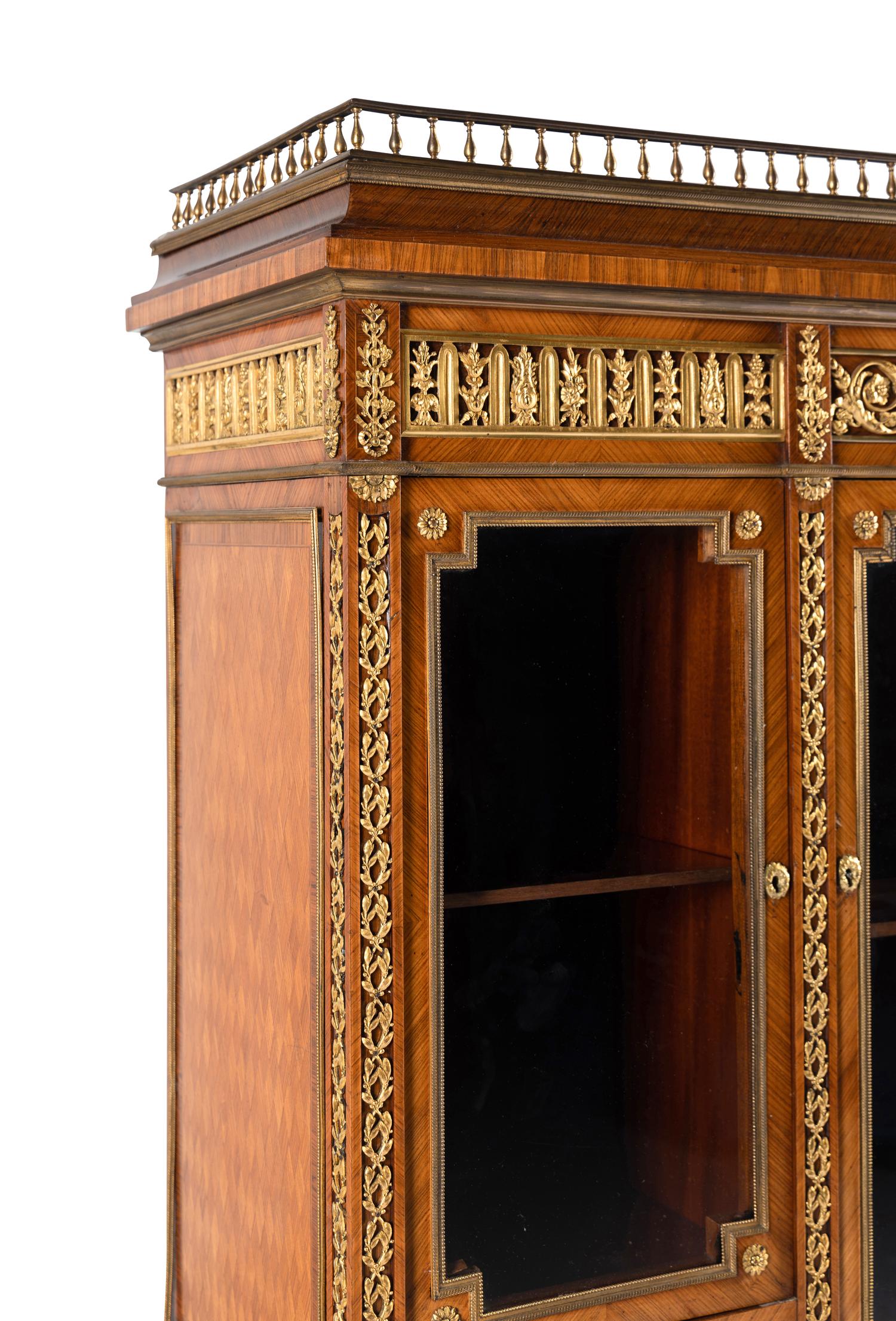 A Louis XVI Style Gilt Bronze Mounted Parquetry Cabinet-on-Stand