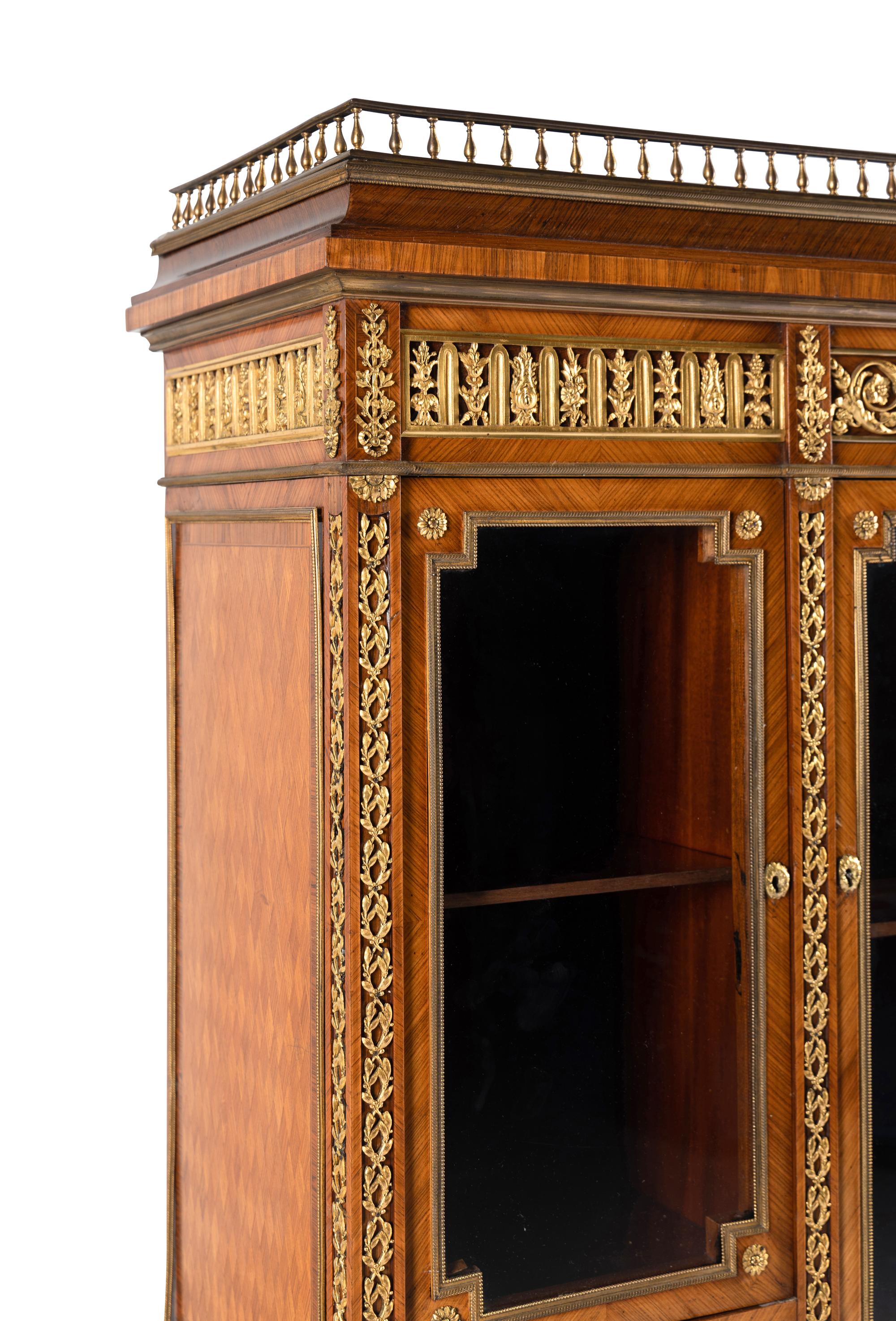 A Louis XVI Style Gilt Bronze Mounted Parquetry Cabinet-on-Stand