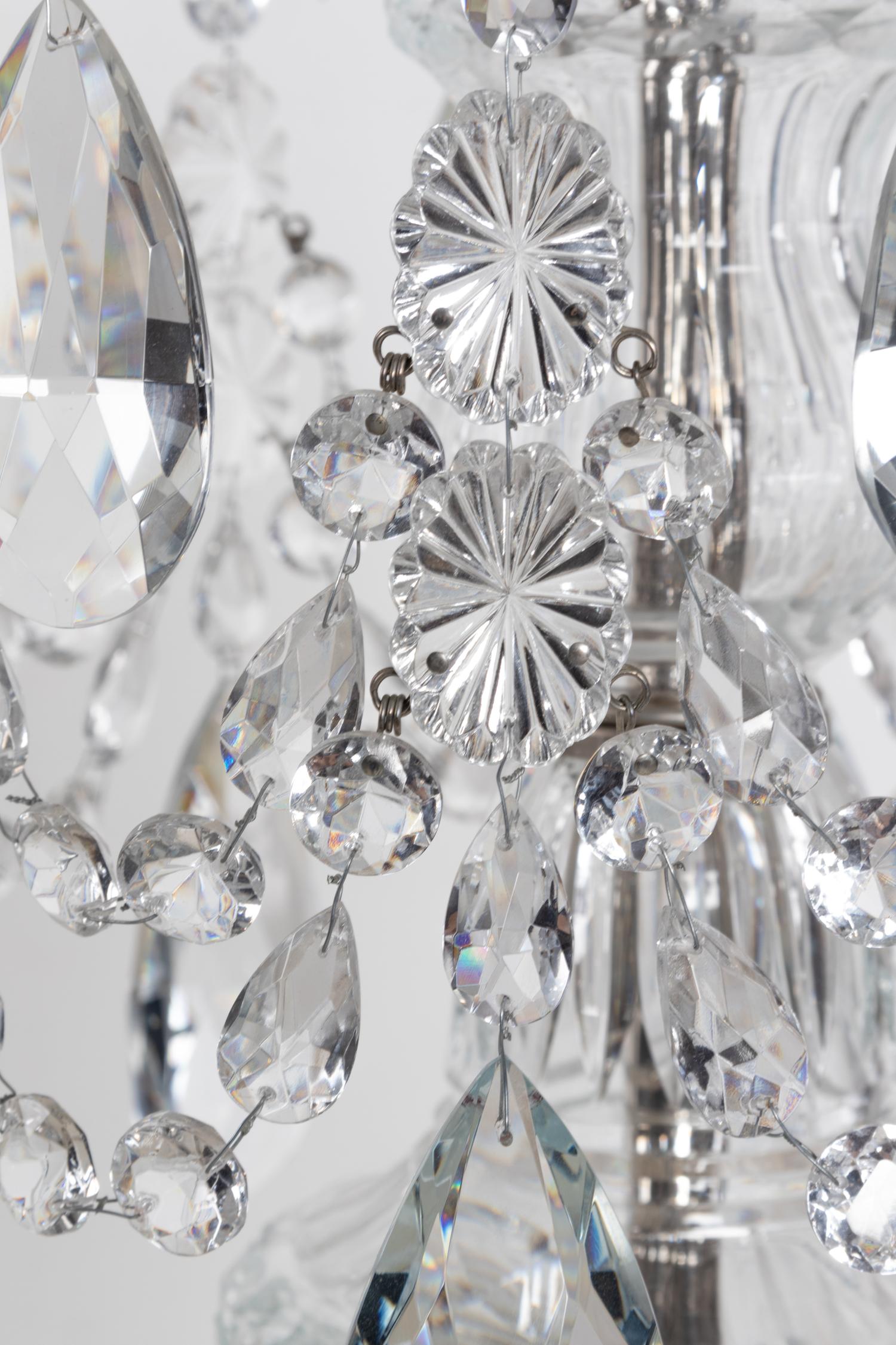 A Pair of George III Style Cut Glass Eight-Light Chandeliers