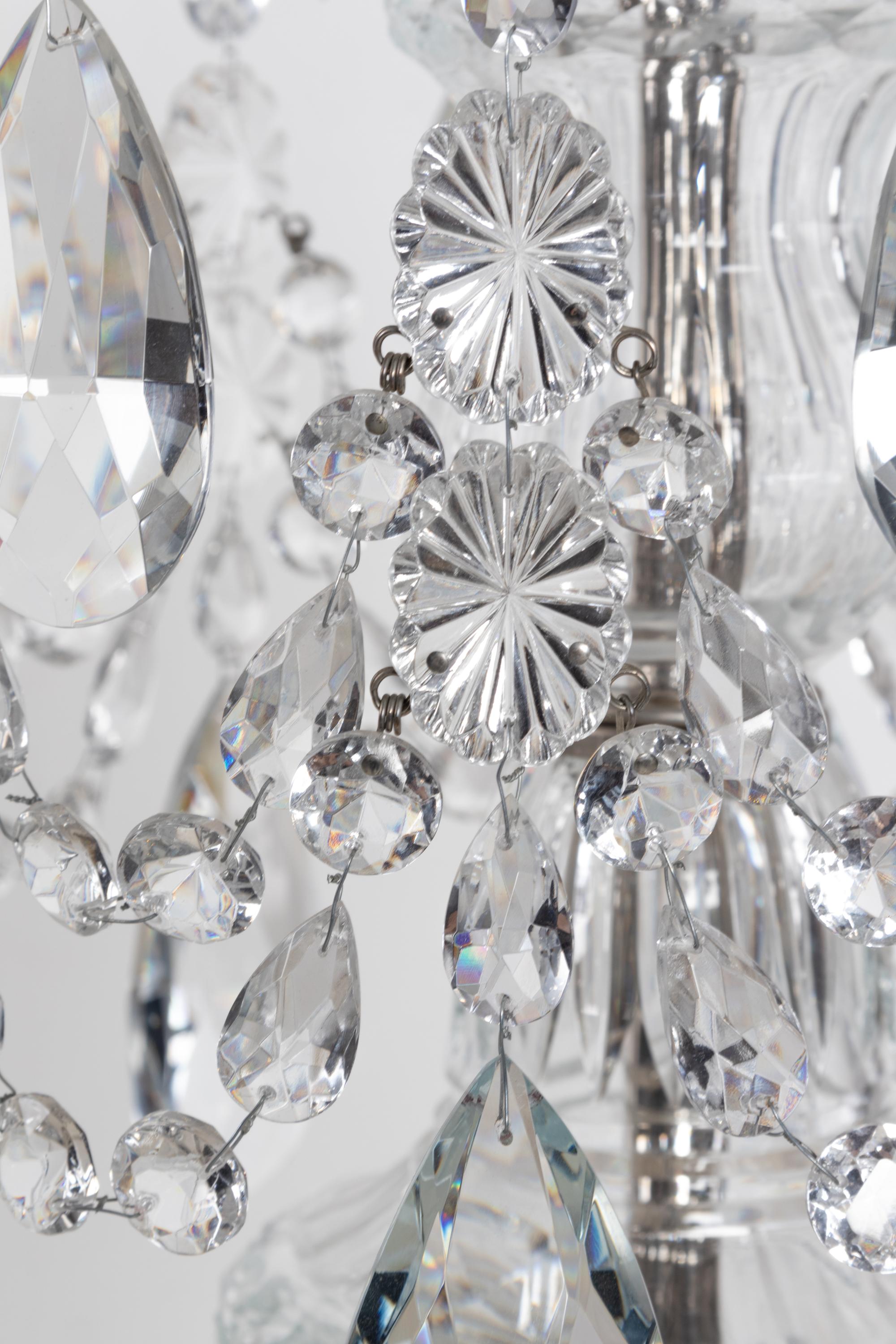 A Pair of George III Style Cut Glass Eight-Light Chandeliers