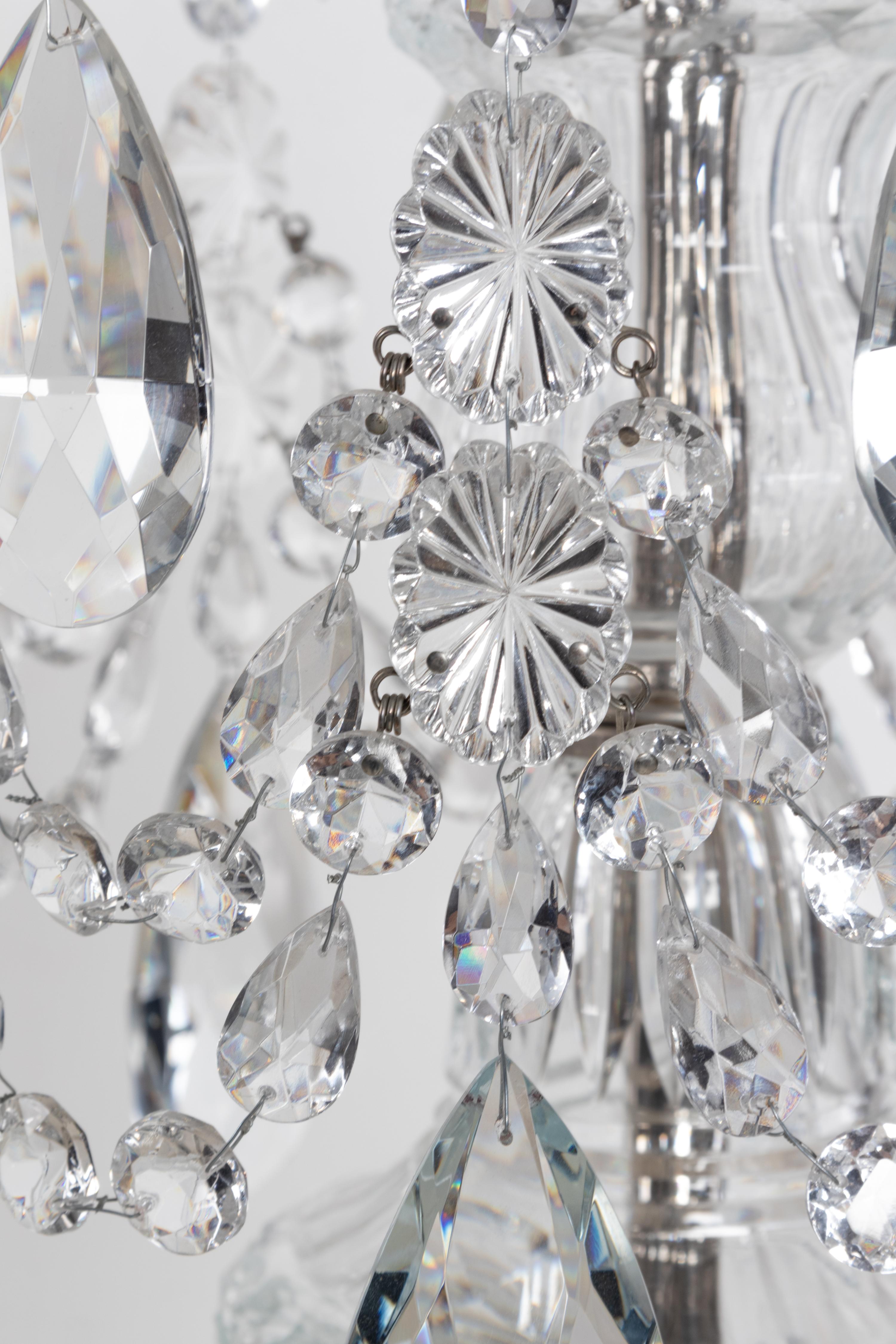 A Pair of George III Style Cut Glass Eight-Light Chandeliers
