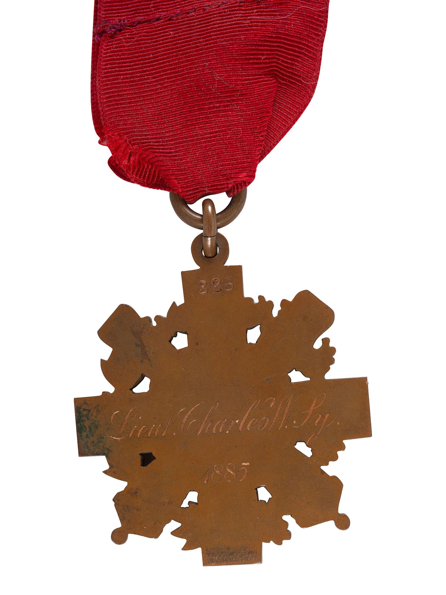 [CIVIL WAR]. Pair of medals presented to Lieutenant Charles W. Sy, including NY Faithful Service medal and pre-war gold regimental medal from the 8th NY National Guard.