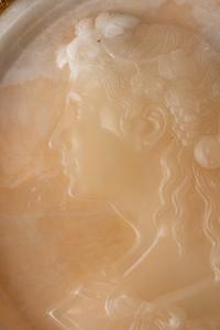 An Italian Carved Onyx Portrait Plaque in a Sienna Marble Frame