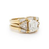 DIAMOND AND YELLOW GOLD RING WITH TWO GUARD RINGS